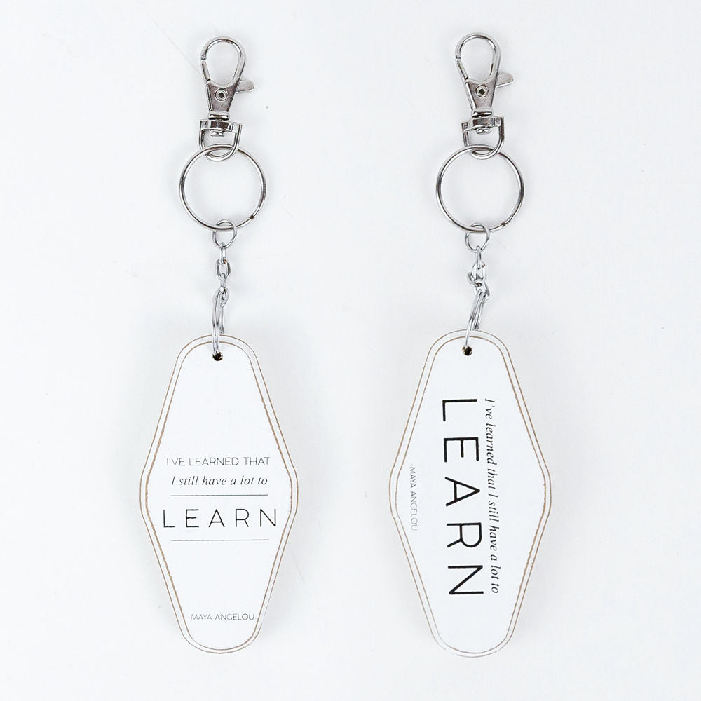 LEARN Keychain | white, black | 1.7x3.5x.5 rvs wd keychain   11133